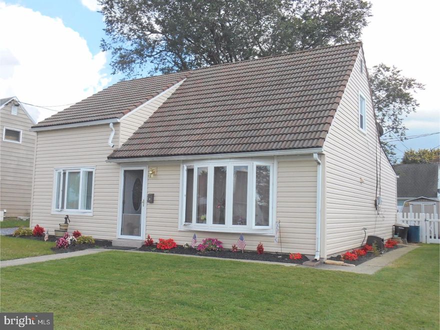 Truly move-in condition 4 bedroom cape is one of the larger homes in the neighborhood. Walk in thru the lead glass front door to a spacious living room with bay window. New Castle windows thru-out the home. The gorgeous oak kitchen has stainless appliances, double sink and ample closet space. To the rear of the kitchen is dining room and family room complete with a pellet stove for cold winter nights. 2 bedrooms on the main level and an upgraded bathroom. Upstairs has 2 additional bedrooms and ample closet space. Sliding patio doors from the family room out to an 8'x 32' deck for entertaining or family get together. A vinyl fenced in backyard make it private. There is a private parking space for two vehicles. Make an appointment to see this move in ready home. See sellers disclosure for all the upgrades.