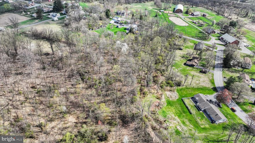 Public Auction Saturday June 27, 2026 @ 12 PM. Open House Saturdays June 6 & 13 from 1-3 PM. Buyer required a 10% non-refundable deposit. Settlement within 45 days. Buyer pays the 2% Real Estate Transfer Tax. List price does not reflect the final sales price. ** Lebanon/Jonestown Area Raised Rancher with a 3 Car Garage on 2.42 Acres. Currently set up as a 2 Unit with each side featuring a Kitchen, LR, 1 BR & Bath. Total SF is 1056. Street Level 3 Car Garage, 24x50 Barn. Note: This Country 2 Unit is in need of renovation. Keep as a 2 unit or turn it in to a single family dwelling. A mostly wooded, level & gentle sloped 2.42 acres.