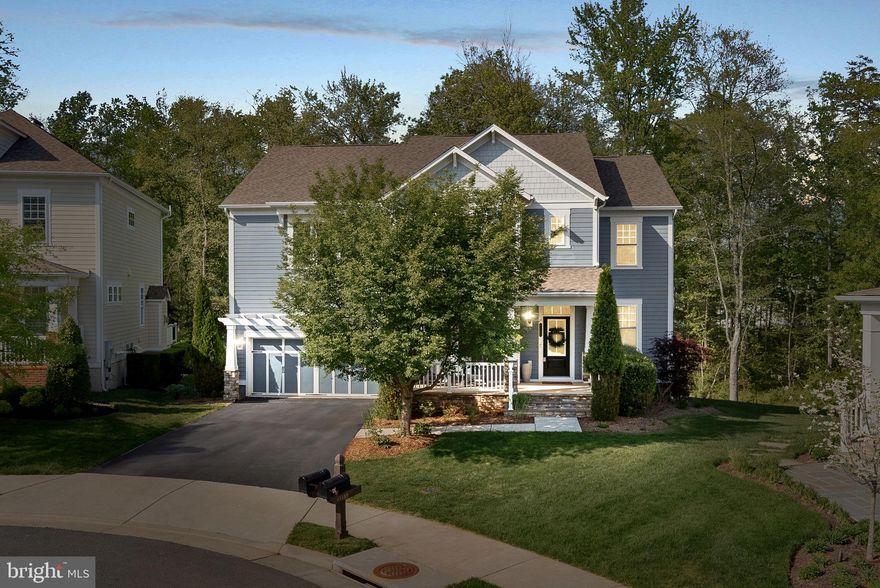 ***$50K PRICE IMPROVEMENT*** Stunning Craftsman-Style Home in The Grove at Willowsford!

Tucked at the end of a peaceful cul-de-sac and backing to mature woods, this beautifully updated home offers space, privacy, and resort-style living in one of Loudoun County’s most sought-after communities. Step onto the charming front porch and into a thoughtfully designed open floor plan spread across three finished levels.

The main level features a flexible layout with a dedicated Playroom/Bonus Room, custom built-ins in the living area and office, and a mudroom with built-in bench. The gourmet kitchen flows seamlessly into the main living spaces, perfect for both everyday living and entertaining including an Office, Breakfast Room and Study Area. Upstairs, discover five bedrooms, including a spacious primary suite with a large custom walk-in closet and a luxurious en-suite bath. There is an additional ensuite bedroom upstairs. 

The basement includes a bedroom and full bath plus a Recreation Room and a Poker/Media Room offer additional flexible living space. Step outside to the screened porch and composite deck, ideal for relaxing while overlooking the tranquil wooded backdrop. Additional highlights include an outdoor storage shed, abundant interior storage, upgraded trim, board & batten details, outdoor sprinklers and indoor HVAC humidifiers.

Step into a vibrant, award-winning community where every day feels like a getaway. Nestled in the heart of Loudoun County’s stunning countryside, Willowsford offers an unmatched blend of natural beauty, modern amenities, and small-town charm. This isn’t just a neighborhood—it’s a way of life.

Indulge in resort-style living with access to outdoor pools featuring beach-style entry, a splash pad for the little ones, a fully equipped fitness center, scenic lake, off-leash dog parks, adventurous tot lots, and even a whimsical treehouse. Winter fun is covered too, thanks to the community sledding hill!

Reconnect with nature and neighbors at the community’s own farm stand and CSA program. Enjoy frequent social events, movie nights under the stars, and seasonal celebrations like 4th of July fireworks—there’s always something happening here.

Located just a short drive from Brambleton Town Center and One Loudoun, you’re never far from top-tier dining, shopping, schools, hospital and so much more. Commuting is a breeze with quick access to major routes (Rt. 50, Rt. 28, I-66), the Silver Line METRO, and Dulles International Airport.

Plus, you'll be part of the highly acclaimed Loudoun County school district and moments from the expansive Hal and Berni Hanson Regional Park. Weekend plans practically plan themselves with countless nearby wineries, breweries, and farmer’s markets waiting to be explored.