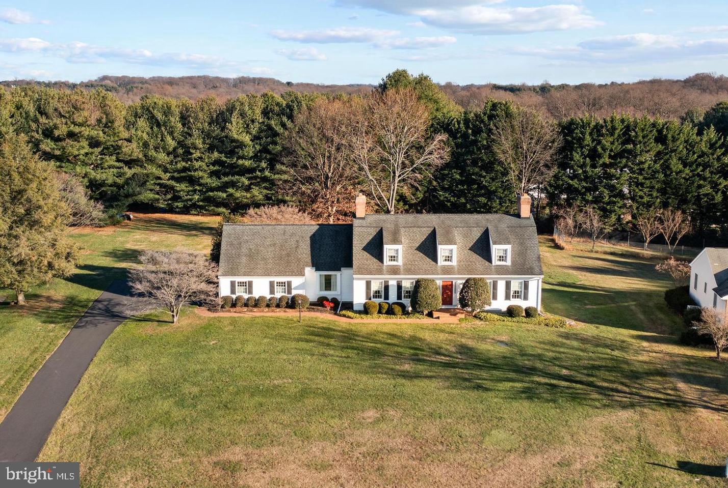 Welcome to this majestic Cape Cod nestled in the picturesque Monkton, MD, just minutes from the charming hub of Jacksonville/Four Corners, offering an array of shops, restaurants, and essential amenities. Custom-built with precision in 1984, this residence has been cherished by its original owner, showcasing unparalleled pride of ownership. Set upon a sprawling, perfectly level .98-acre lot, the property exudes timeless charm and tranquility. Boasting hardwood floors throughout the main level, this home seamlessly combines classic elegance with modern comfort. The expansive basement, currently unfinished, presents an exciting blank canvas, offering endless possibilities to expand and create additional living spaces tailored to your preferences. Featuring three spacious bedrooms and three full baths, this home is designed for both comfort and functionality. The main level hosts a convenient laundry room, while a versatile first-floor office provides flexibility as a fourth bedroom if desired. Cozy up during winter evenings with one of the three fireplaces, one featuring a wood stove insert for extra warmth and ambiance. This residence is a testament to meticulous craftsmanship. It offers a unique opportunity to embrace the serenity of country living while being just moments away from the conveniences of Jacksonville and Four Corners.