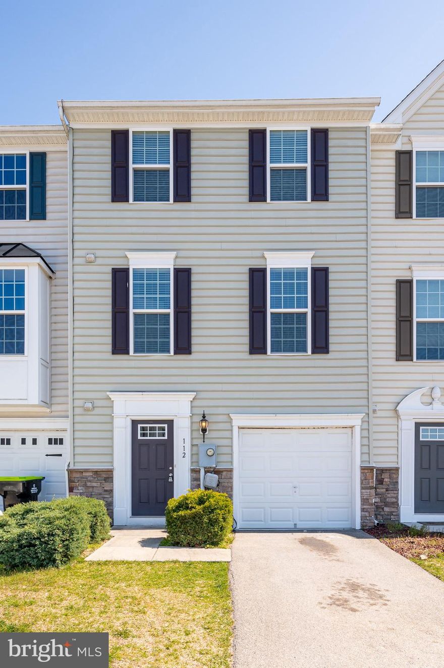 Move-in ready!  Welcome to 112 Norwood Drive, conveniently located in the desirable Potomac Station subdivision in the heart of Spring Mills. This newly renovated  townhome invites you in featuring mature landscaping, a front loading 1 car garage, and Carolina Beaded siding with a stone watertable  accent. The fully finished lower level offers inside access to your garage, a new powder room and a spacious family room with a gas fireplace, perfect for relaxation and  entertainment! On the main level you will find a spacious open concept to your kitchen and living room. The kitchen features 42' cabinets, a kitchen island with pendant lights, stainless steel appliances, a pantry, space for a kitchen table and access to your large rear deck! The main level also has an additional powder room for your convenience. Just upstairs you will find your primary suite with a large walk in closet and primary bath featuring dual vanities and tiled  shower. Two guests bedrooms, 1 full bath and laundry room is also located on this floor. This home has brand new flooring and fresh paint throughout along with a bathroom on each level!  Conveniently located near I-81, shopping, restaurants, and Spring Mills schools gives this home much to offer for any buyer! Welcome to your new home!
