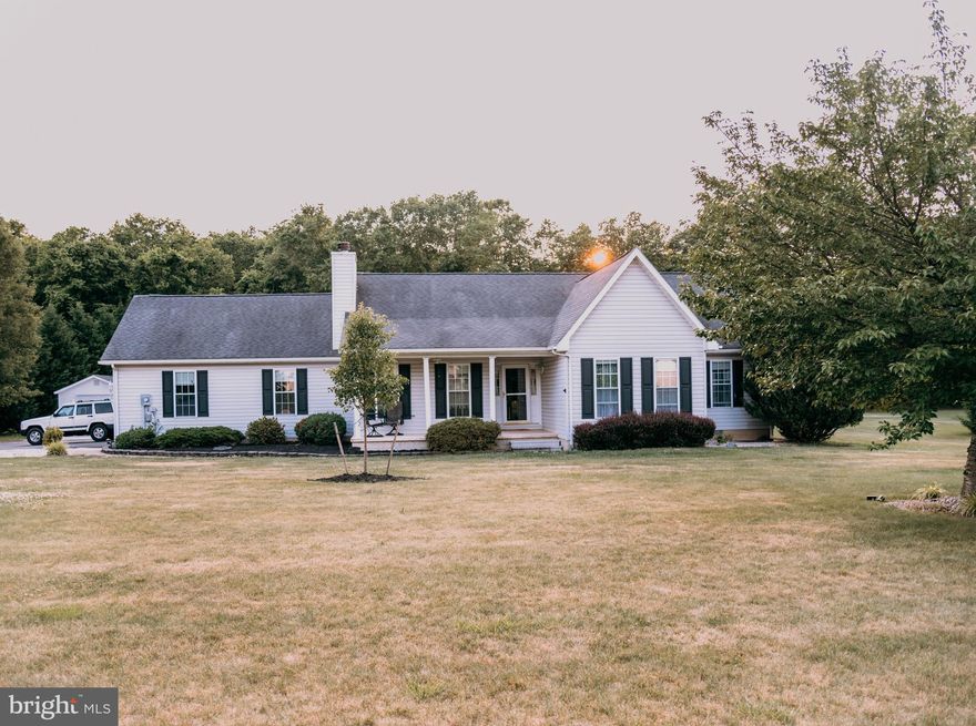 Great opportunity to own this very well-maintained Rancher in Martinsburg, WV. This home features 3 bedrooms, and 2 full baths. The kitchen features granite counters, plentiful cabinet space and a large pantry. A dining area adjoins the kitchen and provides table space with access to outstanding sunroom. The family room provides the perfect space to gather with family and friends. A spacious primary bedroom featuring laminate flooring, offers a private bathroom with a standing shower, walk-in closet, and dual vanity. Two additional bedrooms with large closet space, a full bathroom, a hallway closet, and laundry room complete the inside. The carpet in the home has been recently upgraded! The home also features a freestanding sink and pantry that leads to the two-car garage with openers, utility closet (hot water heater replaced March 2023), and an additional storage room. Outside you will find an additional 1 car garage, with a concrete patio,  an underground electric dog fence, and mature trees throughout the almost one-acre property! Schedule your showing today, you don’t want to miss this one!