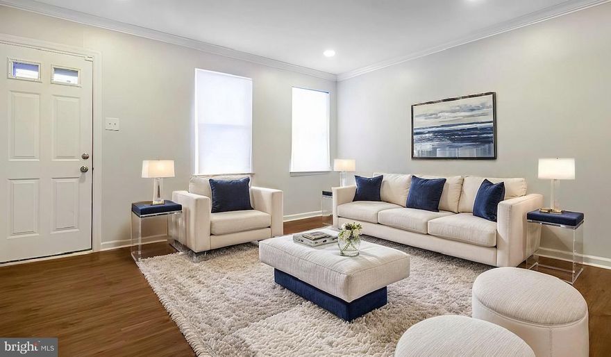 This recently renovated interior townhome boasts beautiful laminate wood flooring throughout the living areas and bedrooms, while the bathroom features updated ceramic tile. The modern kitchen is equipped with granite countertops and a stylish subway tile backsplash.

Designed with an open-concept layout, the living and dining areas seamlessly connect to the kitchen, creating a welcoming and functional space. The home also offers central air and heating for year-round comfort and is conveniently located near downtown Baltimore.

This is the perfect home to start your homeownership journey!