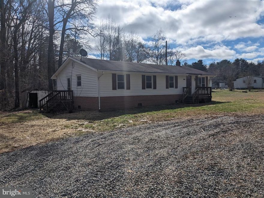 Come see this 4 bedroom 2 bath handyman special on 0.83 acres Louisa County. The property has a 3 year old heat pump for heat and central ac. It has double pane windows, a back deck, and flat yard. All the plumbing and electrical is functional and the house has a new well. The house does need cosmetic work and the kitchen is in poor shape. Owner financing is available with flexible terms. With $12,000 down $1,615 per month fixed rate for 30 years.