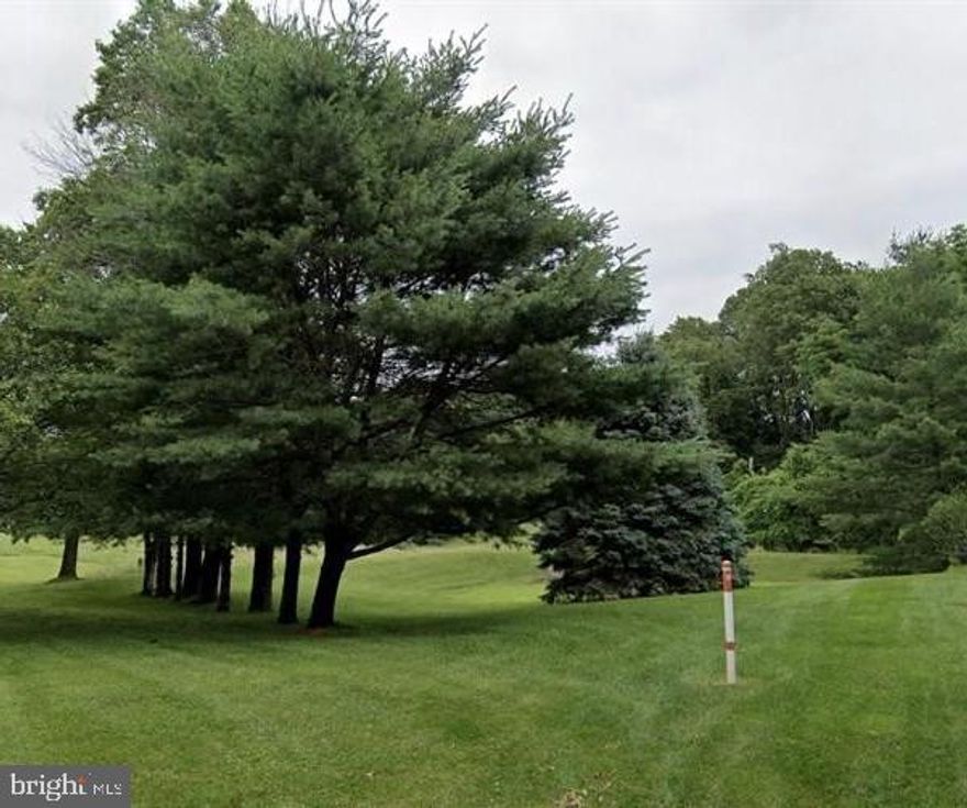 Imagination required! Lot sold as-is where is with no representations from the seller. Buildability of this parcel has not been confirmed and will require due diligence by the buyer. Any potential development is subject to zoning, permitting, and other local regulations. Public water and sewer infrastructure is already available within the existing developement if the lot is deemed buildable. The property is zoned R-20 per public record.  A portion of the lot is currently used for stormwater management and also includes a utility easement with BGE, which may impact buildable area and potential. Buyers are advised of the availability of General Plan Maps at, and to conduct their own due diligence with, the Ho Co Department of Planning and Zoning to confirm allowable uses, setbacks, and future building requirements. There is no survey to provide.  No further information is known about the lot, to include what part of the lot is considered buildable, or the boundary lines, seller offering at this discount so further due diligence will be performed by buyer. **Per appraisal performed, "Site is a Stormwater Management Facility, with residential building potential, after Zoning/Planning Approval and Engineering." Appraisal available in documents was completed with the assumption that zoning/planning, develpment and engineering was completed and approved for a buildable lot.