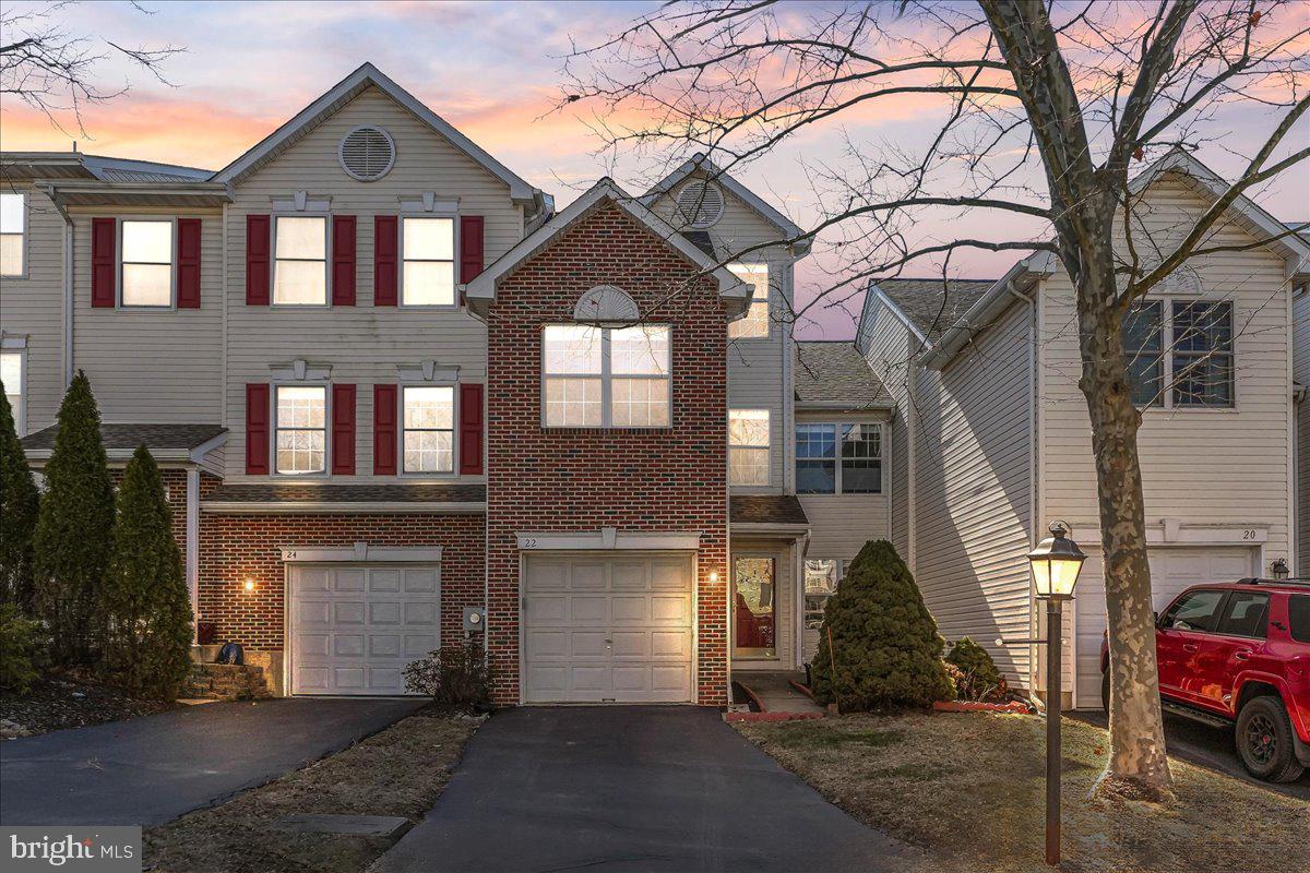 Experience effortless living in this meticulously maintained, east-facing townhome within the coveted Hunt Club community! Boasting 3 bedrooms, 2.5 baths, and a fully finished basement, this residence offers ample space and modern upgrades. Step inside to discover gleaming hardwood floors flowing through the open-concept living and dining area, complete with a cozy fireplace. The kitchen, featuring elegant granite countertops, seamlessly connects to the family room, where you can step out onto your private deck overlooking serene common space. Upstairs, retreat to the spacious master suite with its vaulted ceiling, luxurious en-suite bath, and double sinks. Two additional generously sized bedrooms, a laundry room, and a hall bath complete the second level. But that's not all! A bonus finished loft provides versatile space for entertainment, a home office, or even a fourth bedroom. The finished basement adds another 600 square feet of living space, perfect for recreation or relaxation. Recent upgrades include a brand-new water heater (Jan 2025), fresh paint throughout, and new recessed lighting (Jan 2024). Enjoy unparalleled convenience with proximity to shopping, major roadways, and corporate centers. This move-in-ready gem is perfect for those seeking a comfortable and convenient lifestyle!