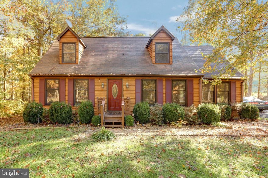 Welcome to Lake Anna Living! This 3 bedroom 2 bath gem is nestled on a peninsula on Lake Anna! Enjoy beautiful lake views from the front windows in the winter and comforting shade during the warm summer months! You have 1.21 acres to store any aquatic vehicles and enjoy the natural surrounding beauty! You will find that living in the Morgan subdivision will give you access to two Gated docks, picnic tables and beach areas as well as being seconds from public lake access. Being moments from fine dining, wineries and breweries make for the perfect entertainment on lazy evenings after spending the day on the lake! This cape style home has a living room and family room downstairs to allow your family and guests ample space to spread out. The Eat in kitchen leads out to an enormous back deck that’s perfect for grilling or chilling! The primary bedroom is the ENTIRE upstairs! This room comes equipped with book shelves and the cutest reading nook for those lazy lake mornings! At this affordable price, do not miss this opportunity to own a prime piece of property on the much sought-after Lake Anna!