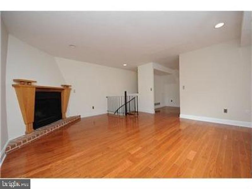 Rarely offered, dynamite two bedroom townhouse in the heart of Queen Village including two car FREE PARKING and ALL UTILITIES is now available! The eat-in kitchen features a garbage disposal, dishwasher, heated floors, generous cabinet space and exposed brick. Just off of the kitchen is a private deck which is ideal for grilling, relaxing and entertaining. On the second floor is a large living space with a working fireplace and den, which could double as an office or recreation room. Both rooms have hardwood floors and get an amazing amount of natural light. On the third floor, you'll find two bedrooms with cozy carpeting, a storage closet with laundry and a full bathroom with heated floors. The heated floors can be programmed for your comfort.840 A South American Street is just steps from Royal Sushi and Izakaya, New Wave Cafe, Philadelphia Java Co., Headhouse Farmer's Market, Mario Lanza and Spruce St. Harbor Parks, SEPTA's 57 and 40 bus routes and so much more. Dogs are welcome. No cats, please. All utilities are included in the rent (this does not include cable/internet).