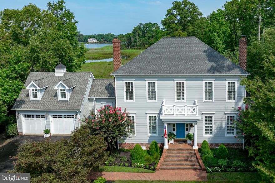 This  Annapolis retreat in the sought-after Fishing Creek Farm community is one you don't want to miss! Perfectly sited on a quiet cul-de-sac, this home is ready to move into and elegantly designed for both everyday living and entertaining. Extensively renovated with architectural and interior upgrades, the residence offers almost 3,700 square feet of thoughtfully designed space. The bright, open chef’s kitchen boasts custom cabinetry, marble countertops, designer backsplash, and top-of-the-line appliances—perfect for preparing intimate family meals or hosting large gatherings.
Step outside to the expansive deck, and enjoy views and breathtaking sunsets over Fishing Creek. The first floor includes a guest bedroom with full bath and an extra half bath, while the serene primary suite upstairs features water views and a beautifully renovated bathroom. Two additional en suite bedrooms complete the second level, complemented by updated baths, and fresh carpeting. Pull down stairs lead to additional attice storage as well as under the stairwell, and the eaves in the loft.
Don't miss the  versatile loft above the garage that provides the perfect space for a home office, gym, or recreation room and lots of storage accessed off the back deck. Pull down attic stairs for additional storage. Invisible fence. Access  to community beaches from 3 spots: across the street, from Southbreeze and from Cherry Tree. And, at high tide, you can access the water in front of the house with your kayak!
Living in Fishing Creek Farm offers more than a home—it’s a lifestyle. Residents enjoy resort-style amenities, including a private community beach with fire pit, pool, tennis and pickle ball courts, walking trails, and an active marina.