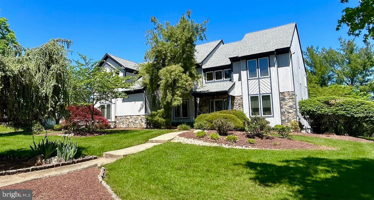 Welcome to this well kept home located in the Hills of Northampton. First floor bedroom expanded to add full bath with large closet with built in safe. Large finished basement that is ideal for entertaining. Large island kitchen with exit to rear deck overlooking beautifull open space with a walking trail . Vaulted ceiling in family room with a floor to ceiling stone gas fireplace. 2 staircases leading up the to 2nd floor. Large main bedroom with a full bath that includes a jacuzzi tub and a separate shower stall. Jack and Jill bathroom. Ceiling fans in all bedrooms and family room. Includes an underground sprinkler system . Also there is a separate room off of the main bedroom that could be used as an office. Includes 2 chairlifts inside and 1 stairlift in garage. New roof installed 2012. Two Zoned heating and Air conditioning. 2 separate HVAC systems. Located in the award winning Council Rock school District.