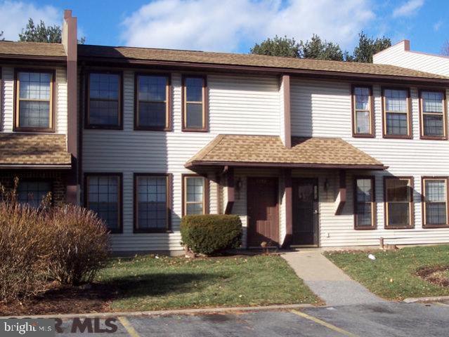 Great unit for residence, 2nd home or investment! Spacious eat-in kitchen with ceramic tile flooring & adjacent laundry. Pantry closet. First floor powder room. Impressive living room with wood laminate flooring. Stair & 3 second floor bedrooms boast new carpeting. Rear patio addresses natural area with mature trees. Exterior storage closet off deck. Each unit receives one parking pass. An additional parking space can be purchased (first come, first serve basis) for $75 per year. Convenient to Point Park, bus route, town, campus & shopping. Freshly painted and move-in ready! You won't want to miss this one!