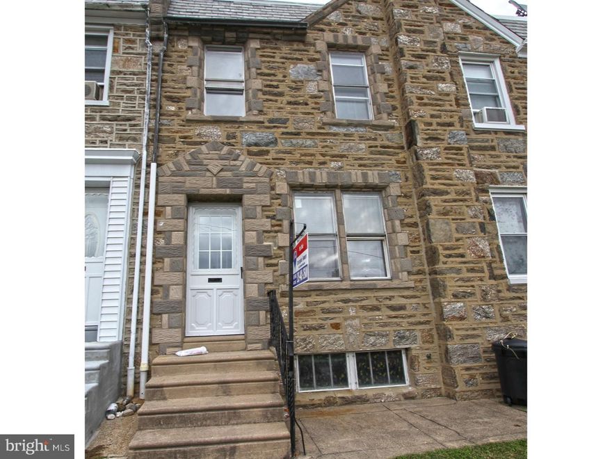 Beautiful two-story stone front with large front yard patio and a rear driveway and garage. Enter into a formal vestibule with spacious and open living room and dining room with stunning hardwood floors and chair rail trim.   The kitchen is very large with plenty of cabinets filled with sunlight and is large enough for an eat-in-kitchen table with room to spare. The kitchen has a built-in counter top, range wall oven, dishwasher and refrigerator. There is access to the large, full basement through the kitchen. Tons of storage space in the basement with an opportunity to convert into a finished basement. Laundry room in the basement. On the second floor they are three spacious bedrooms with ample close space and a full hall bath with original tile work in excellent condition as well as soaking tub and stall shower.  Private garage and driveway in rear which allows parking for multiple cars.  Large block is beneficial for street parking.  One of the best locations in Mayfair !  Easy to show and we welcome your visit today.