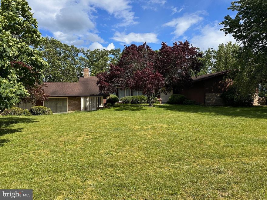 Remarkable 4 bedroom, 2 bath home on just under 2 acres.  Very bright with natural light and hardwood floors.  A wood stove in the living room and large kitchen with many upgrades are also nice features. Full basement  and set up with a recording studio currently. Plenty of storage and the home is in a great location for easy travel.  Heated pool with large deck for outside living.  Beautiful mountain views in the front and the back (Sleepy Creek in the back and Cacapon Mountain in the front).  Great yard space with a garage and a shed as well. Central heat and air for comfort. Side load garage and a shed in the yard .  A must see!