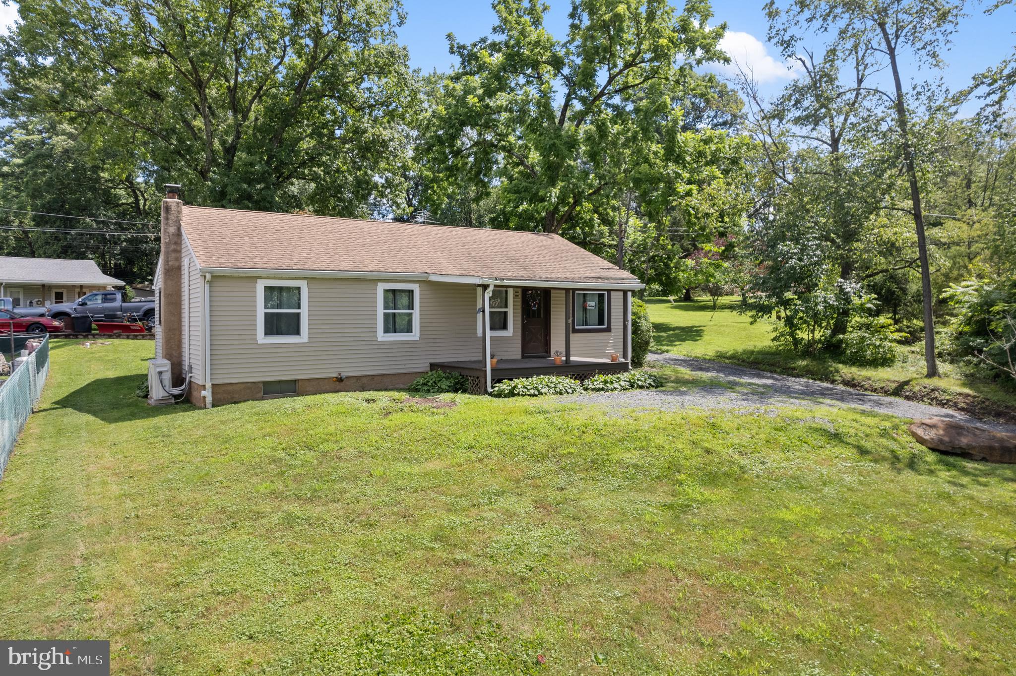 Welcome to this beautifully updated and affordable ranch-style retreat, nestled on a peaceful .31-acre lot in sought-after Union Township. Just minutes from French Creek State Park, you’ll have endless outdoor adventures — from scenic hiking trails to fishing and kayaking — right at your doorstep. Step inside to a bright, move-in-ready interior featuring new flooring and carpeting throughout, fresh paint, and large picture windows that fill the home with natural light. The open-concept eat-in kitchen, complete with a newer range and dishwasher, is perfect for cooking and gathering. The spacious living room offers a warm, inviting space to host family and friends, while the oversized primary bedroom (converted from two bedrooms) provides exceptional comfort and flexibility. There are two full bathrooms — one on the main level and one on the lower level — offering added convenience. Enjoy peaceful mornings on the covered front porch or take advantage of the insulated one-car garage with attic storage — a rare find at this price point. Additional highlights include public sewer, an on-site well, a newer roof, windows, and water heater (all replaced in 2018), a new pressure tank (2024), and new mini-splits (2024) for year-round comfort. With low taxes and a tranquil setting, this home offers the perfect blend of affordability, quiet living, and easy access to nature and local amenities. Don’t miss out on this rare opportunity, schedule your private showing today!