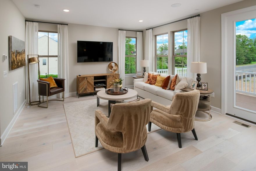 This beautiful front load 2-car garage townhome boasts an open floorplan that is great for entertaining! The lower level recreation room is great space for a family room, home office or additional guest bedroom and bathroom. The main level boasts an expansive chef's kitchen perfect for entertaining. Enjoy cozy nights in your open great room with friends and loved ones, or take the party outside and enjoy starry nights on your expansive main level deck off the great room. The upper level features a primary suite with a large walk-in-closet and two secondary bedrooms with a hall bath. *Photos are of a similar home