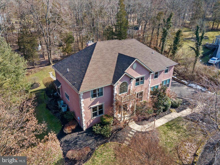 Seller Assist of $75,000 Now Being Offered to Buyers! AND a Price Reduction to $1,275,000.  All this in one of the most exclusive executive neighborhoods in New Hope Borough. The beautiful design and effortless flow of 15 Kingswood Drive combine for an incredibly inviting home with numerous options for work, artistry, and entertainment. Reflective of the home's style and use, the entry foyer is expansive, bright, and welcoming with a sunny disposition that carries throughout the home.  Also, if you are searching for the perfect layout with main level bedroom/full bath as an option, this is the home for you. In addition, the current artist/drafting studio also on the main level is a haven for creativity. The entire main level offers dazzling opportunities for pure enjoyment and the inclusion of multiple generations.  The upper level primary suite is voluminous with sleeping and sitting areas and a bath that every owner will fully appreciate with its thoughtful layout and discerning use of materials.  Another full bedroom en suite is just outside the primary's and, at the end of the long hall, a very special two bedroom princess suite with shared bath creates many ideal options. The lower level is currently partially finished with a home gym, gaming area, and extensive storage and utility room but the exceptional and very useful surprise can be found within the oversized three car garage and that is the utility room that can be used as a workshop, potting shed, or any other creative endeavor as it is heated and has a wash sink.  The home resides on just over one acre of land with an expansive deck facing a mature wooded landscape.  The property, within the premiere Kingswoods neighborhood and New Hope Borough, is just minutes from all of the restaurants, galleries, theaters, and night life that both New Hope and Lambertville have to offer.  New Hope remains a preferred destination with its reasonable tax rate and highly regarded public and private schools and the historic downtown area is rated as one of the top attractions unto itself located on the banks of the Delaware River and Historic Delaware Canal.  The home ideally presents itself within the gracious suburban lifestyle you seek yet is convenient to the necessities of New York City, Princeton, and Philadelphia. Its time to make fabulous Bucks County home, not just for a weekend but for a lifetime.