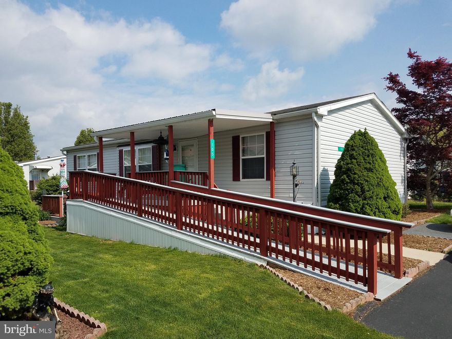 The perfect manufactured home at Pheasant Ridge! If you are looking to live in Pheasant Ridge, look no further! This well maintained unit has lots to offer from it's spacious 3 bedroom, 2 full bathrooms to it's wide open kitchen layout with lot's of cabinet and pantry space. Located in a cul-de-sac off the main streets, you can enjoy summer evenings sitting and relaxing on the large front porch and deck. Homeowners recently added composite decking to the upper porch, a porch roof and access ramp as well as adding a 3rd paved parking space out front. Refrigerator, Range, Microwave, and Dishwasher were all updated in 2015, Washer and dryer were purchased in 2016 - all appliances stay with this unit! This will go fast - so schedule your showing soon before you miss out on this great opportunity!