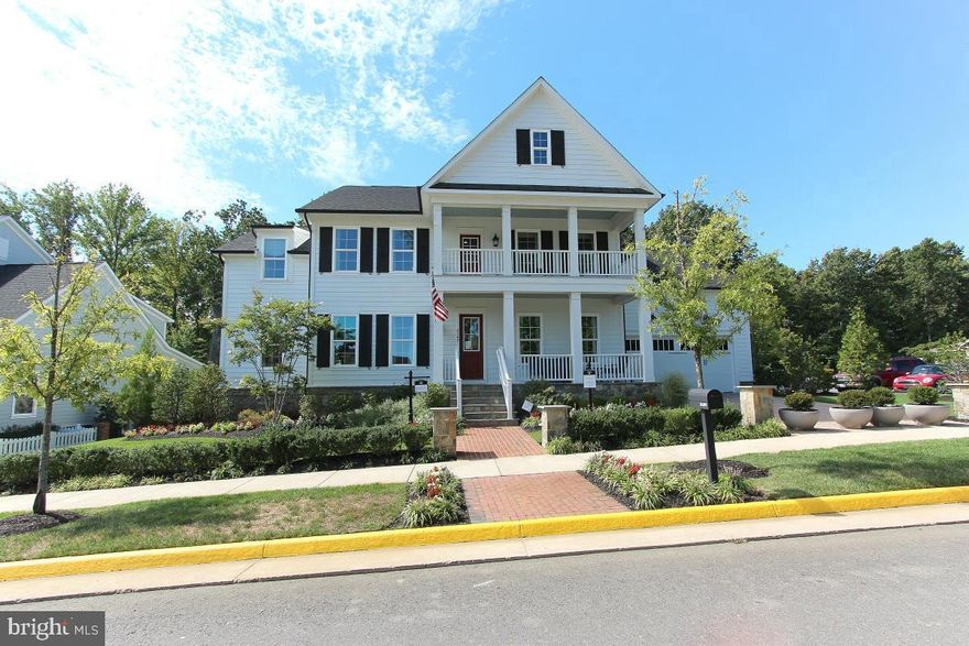 **Largest Home in Potomac Shores. Luxurious former NV Model Home with lots of upgrades throughout the home. Relax in style with a large outside covered porch in the front and rear as well as a balcony off the upper level. Extensive patio and outdoor entertainment area. Five bedrooms on the upper level that includes au pair suite and one bedroom in the basement. Every bedroom has its own bathroom. Main level has spacious two offices. Upper level laundry and lots of built-ins through out the home. Basement includes wet bar, wine cellar, media room, & recreation room to entertain everyone. Newly updated luxury vinyl flooring through out basement. Home backs to the 3rd hole of the Jack Nicklaus Signature Design, Potomac Shores Golf Club. Imagine spending your days in this resort style home. No Need to go away for vacation, the community offers numerous amenities!