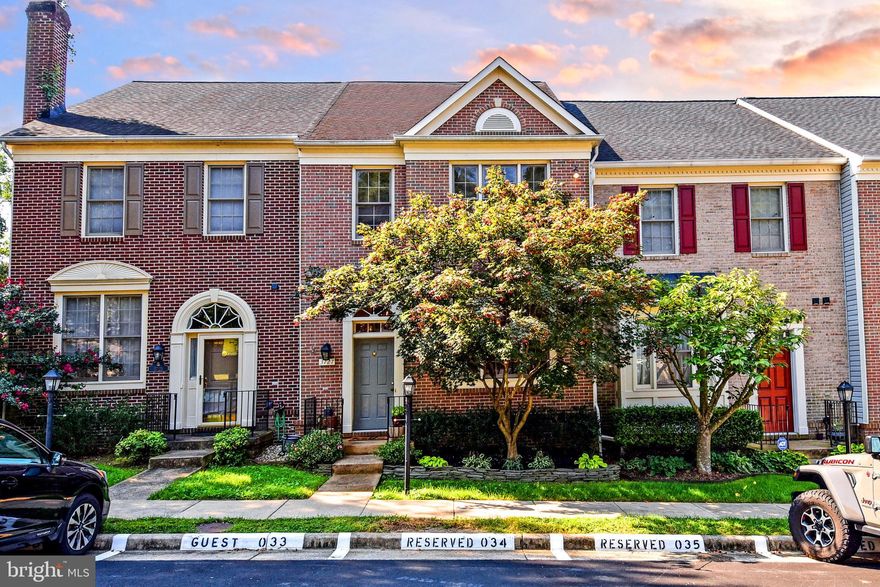 Beautiful brick front townhouse located in the Huntley Meadows Community.  This home shows pride throughout and features gleaming hardwood floors on the main level in the foyer,  powder room, living and dining room.  The bright and spacious table space kitchen with a bump out and new skylights was upgraded in 2017 that features quartz counter tops, ceramic tile back splash,  stainless steel appliances, and  large island with granite counter tops, extra cabinets, wine chiller, and counter height seating.  The deck accessed from the kitchen lends private serene views of the Huntley Meadows nature preserve.  The upper level has a large primary suite with vaulted ceilings and walk in closet.  The spa like bathroom has a double vanity, soaking tub and walk in shower.  There are two additional bedrooms and a full bathroom.  The full walk out lower level basement has a nicely finished rec room with a  corner gas fireplace, an additional full bathroom, laundry room, and some extra space for storage.  From the walkout basement you can enjoy the private patio and fenced in back yard.  Other updates include the furnace replaced in 2010 and CAC unit 2013, hot water heater in 2015, and refrigerator in 2020.