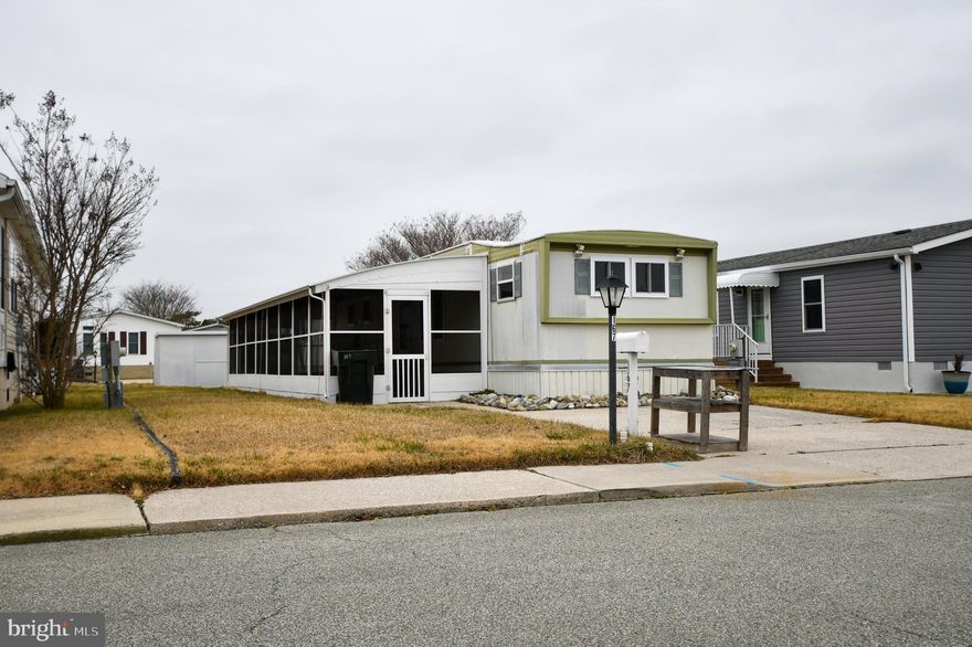 Welcome to this charming 3-bedroom, 1.5-bathroom mobile home in the desirable Montego Bay community in Ocean City, MD. With a little TLC, this home could become your perfect beach getaway! The open-concept kitchen and living room create a spacious, inviting atmosphere, while the screened-in porch offers a relaxing spot to unwind. Residents enjoy fantastic amenities, including two swimming pools, tennis and pickleball courts, a mini-golf course, and a scenic pond with a walking and jogging path. The community also boasts a boardwalk with three piers, providing stunning water views. Blocks away from the beaches and conveniently located near shopping, this home is the ideal coastal retreat!