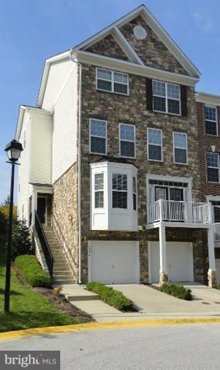 Like new & lovely town house in Russett.  4 levels w/3bdrms, 2.5 baths; kitch w/hdwd flrs, stn steel apps, granite countertops,  2 pantries & 2 ovens; gas fireplace in living room with crown, and dining rm w/crown and chair rail moldings; balcony; washer/dryer; large mstr bdrm w/spacious walk-in closet; jetted tub, separate shower & dble sinks in master bath; 1-car garage; available immediately.