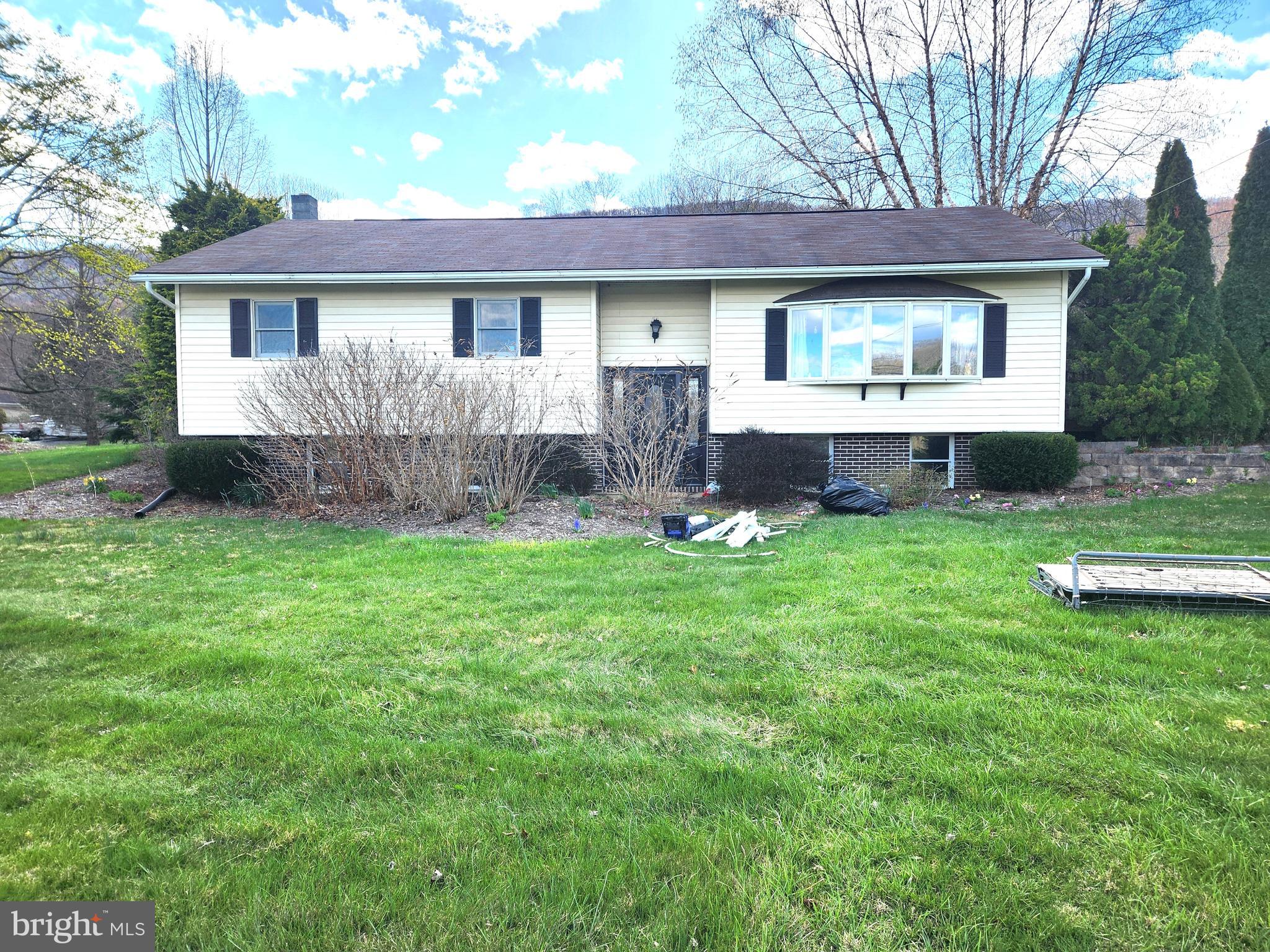 Are you looking for a move-in ready home in the NBC School District? Then come have a look at this 3 bedroom, 2 bathroom home with a partially finished basement. With almost 9 acres of land, you'll have plenty of room for outdoor activities. This split entry home has been well-maintained. The living room has a large window for lots of natural light. The kitchen and dining room is an open concept with lots of cabinet space. The common bathroom was updated and has ceramic tile flooring. The primary bedroom features an en suite bathroom with a shower stall. The basement has been nicely finished. It features a large family room for entertaining, an office or 4th bedroom and a full bathroom with a ceramic tile shower. If garages are your thing, you'll like the 40 by 40 garage that is capable of holding an RV on one side and two cars on the other. There is even a small man cave in the garage. The side deck is a great place to relax with your morning coffee or to unwind after a long day's work. The spacious back yard is perfect for a garden or outdoor activities. The woods behind the house have trails for hiking or biking or just enjoying nature. Buyer to verify acreage and square footage. Aerial map in listing is for reference only. Seller must find suitable housing. Taxes do not reflect Homestead Exemption.