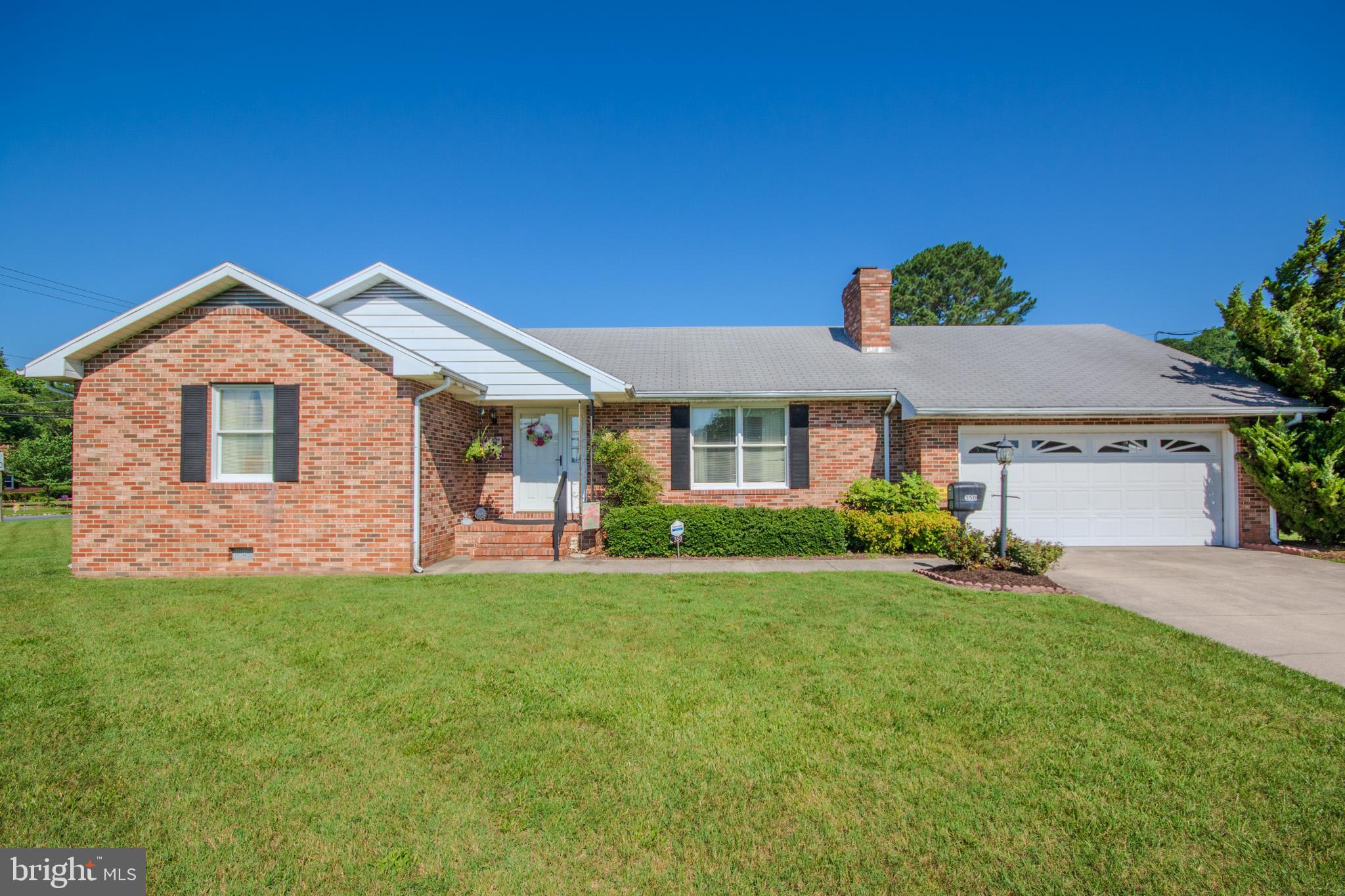 This beautiful all brick home is one story living at its best. This very well-maintained rancher sits on 1.05 acre on the East side of Salisbury. Plenty of yard to spread out or to add an addition. The front door opens into a lovely, tiled foyer, off to your right is a nice sized family room. The brick wood burning fireplace (currently with gas insert) is the focal point, flanked by custom built-in shelves and cabinets. The large window brings in lots of natural light. Further through the foyer is the large dining area that is open to the kitchen. Plenty of room for a large dining table. The kitchen has been updated, including granite counters and plenty of cabinets, with pull-out shelves for easy access. Off the kitchen is a really nice sized laundry room, it has a wall of cabinets with extra counter space. A half bath is conveniently located through the laundry room. This space also has a coat closet just inside the entrance from the garage. The garage is large and offers built-in storage, including access to the living room cabinets to supply wood for the fireplace. The back of the house ( off the dining area) has a sunroom perfect for a second living space, or office, it also has a door to the backyard. The 3 bedrooms are on the left side of the foyer. The primary bedroom offers two closets for double the storage. The hall bath is updated and has a nice tiled walk-in shower, along with tile floor. Two more bedrooms complete that end of the house. The detached garage is large, can be used as a garage, or would be perfect for storage, a workshop, gym or small business. This home is a must see!!
