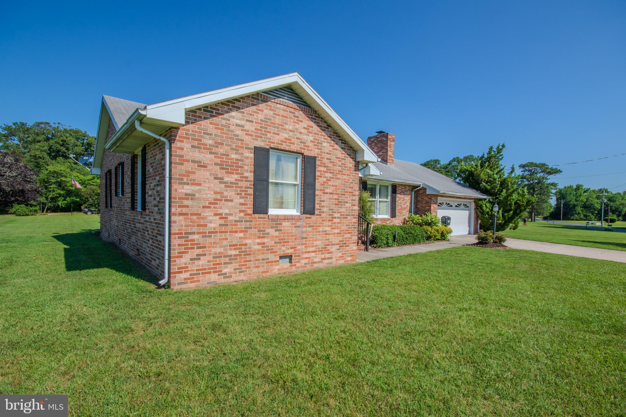 This beautiful all brick home is one story living at its best. NEW HVAC system was just installed. This very well-maintained rancher sits on 1.05 acre on the East side of Salisbury. Plenty of yard to spread out or to add an addition. The front door opens into a lovely, tiled foyer, off to your right is a nice sized family room. The brick wood burning fireplace (currently with gas insert) is the focal point, flanked by custom built-in shelves and cabinets. The large window brings in lots of natural light. Further through the foyer is the large dining area that is open to the kitchen. Plenty of room for a large dining table. The kitchen has been updated, including granite counters and plenty of cabinets, with pull-out shelves for easy access. Off the kitchen is a really nice sized laundry room, it has a wall of cabinets with extra counter space. A half bath is conveniently located through the laundry room. This space also has a coat closet just inside the entrance from the garage. The garage is large and offers built-in storage, including access to the living room cabinets to supply wood for the fireplace. The back of the house ( off the dining area) has a sunroom perfect for a second living space, or office, it also has a door to the backyard. The 3 bedrooms are on the left side of the foyer. The primary bedroom offers two closets for double the storage. The hall bath is updated and has a nice tiled walk-in shower, along with tile floor. Two more bedrooms complete that end of the house. The detached garage is large, can be used as a garage, or would be perfect for storage, a workshop, gym or small business. This home is a must see!!