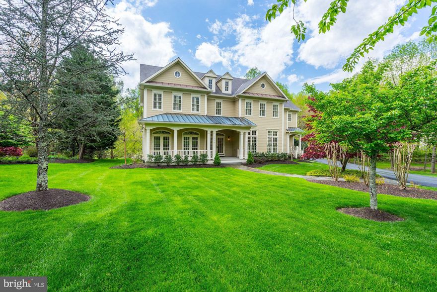Have amazing views while working from your home office!  Sited on almost two acres with sweeping vistas, this French Country style home is truly beautiful and exquisite with designer appointments and rich finishes throughout * Architectural features include 10+ ft ceilings , 6 sets of French Doors with arched transoms opening to the back covered veranda * Open floor plan with large light filled rooms with walls of windows is ideal for large scale formal entertaining or cozy gatherings around the kitchen and family room * Over 6800 sf of  mint condition living with 5 bedrooms and 5.55 baths on almost two acres with spectacular vistas within 10 minutes of Tysons, 495 and the Toll Road. The gleaming Chef's kitchen is complete with two sinks, six burner Wolf stove, Bosch dishwasher and Subzero refrigerator and  kitchen island  * A dramatic Great Room features a gas fireplace flanked by floor to ceiling built ins,  a wall of windows and triple sets of French Doors opening to the covered back terrace * The lovely Southern covered porch with a beaded ceiling and ceiling fan is a great retreat to enjoy the serene setting with beautiful vistas including the private backyard * The library is tucked away from the main living area and has floor to ceiling built ins and a walk in closet and two sets of French doors opening to the covered veranda (this room could used as a main level bedroom with an adjoining bath). The upper level has hardwoods and plantation shutters throughout with three en suites and a private master suite with a gas fireplace and tray ceiling, his and her closets,  luxury bath with two vanities, large shower and two person soaking tub.  The walkout lower level is finished with a bar, guest suite with full bath, a billiards room and an expansive recreation room  as well as two good sized storage rooms * Surround sound on all three levels including the back terrace * Located on a quiet cul de sac , property is attractively landscaped including flagstone walkways to the main and secondary front entrances * In addition there is a three car side load garage with a generous parking pad for additional cars * Just 10 minutes to either downtown McLean, Tysons or the Village of Great Falls and Great Falls and River Bend Parks with hiking paths and spectacular views of the Potomac River.