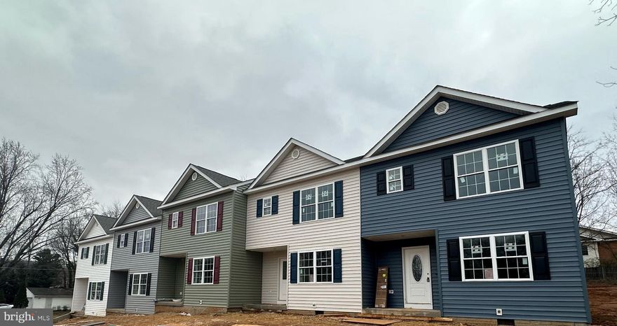 New Construction  Ready End Of February 2023! 1/30  Interior Painting & Cabinet Delivery!   Buy Cheaper Than You Can Rent! Comcast/Xfinity Available! Mid Unit 3 Level, Open Floor Plan Town Home Offers Lots of Living Space With All The Upgrades! In Town Location A Short Distance to Shopping, Restaurants & Down Town. Elegant Bright Clean Design With All The Upgrades Included. Great Open Floor Plan Offering Luxury Vinyl Plank Flooring On Main Level, Granite Counter Tops, Stainless Steel Appliances, Spacious Kitchen with Dining Area, Tiled Baths & Carpet in Bedrooms. Large Master Suite with Full Bath & 2 Additional Upper Level Bedrooms. Unfinished Basement For Future Living Space. 10 x 10 Deck No HOA. Paved Or Concrete Driveway, Off Street Parking. Minutes to Down Town Front Royal , Ball Parks, Town Pool, Skate Board Park, Convenient To I-66 & Everything You Need. Hurry You Can Pick Your Colors! Builder To Offer One Year Builders Warranty Backed By DPOR See Docs.  Photo's Similar