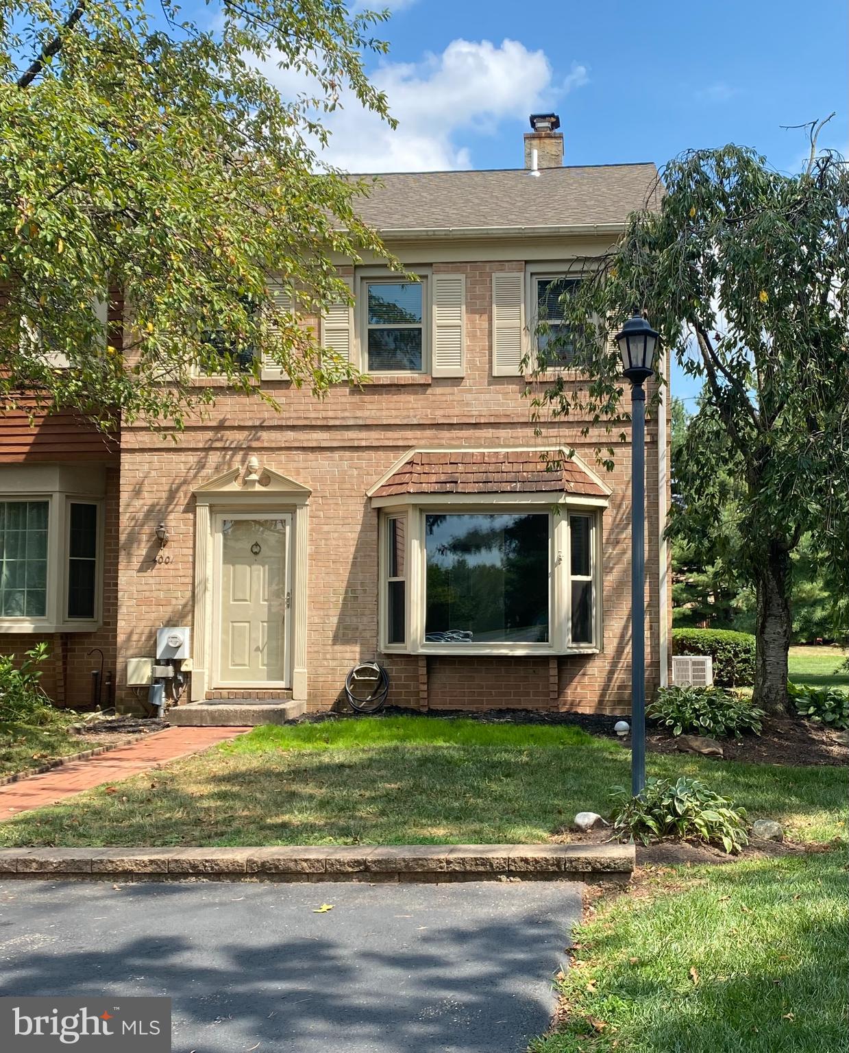 Beautifully updated and spacious end-unit townhome located in the highly desirable Carriage Run Community, steps from charming Skippack Village. As an end unit, it features additional windows that fill the home with natural light throughout the day. The main level offers an open layout that includes a large living room, a convenient powder room, and an upgraded eat-in kitchen complete with white soft-close shaker cabinets, granite countertops, stainless steel appliances, and a sliding glass door that leads to the rear deck. Upstairs, you'll find a spacious primary bedroom with an en-suite bath, two additional well-sized bedrooms, and a second full bathroom. The full basement provides ample storage space and includes a laundry area with a full-sized washer and dryer. Enjoy walking distance to the unique shops, restaurants, and events in Skippack Village. Outdoor enthusiasts will appreciate the nearby Perkiomen Trail, Evansburg State Park, and Palmer Park. Easy access to Routes 73, 29, 113, 422, and the PA Turnpike.