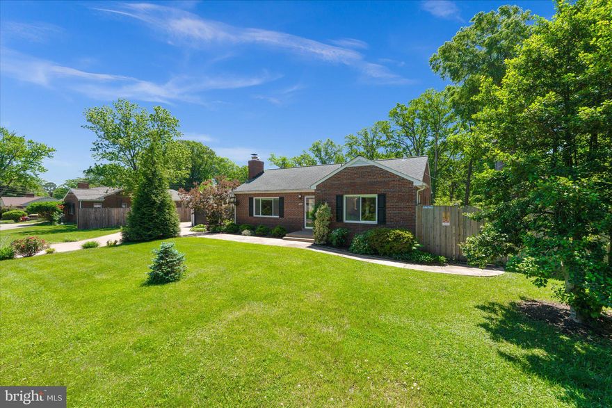 Welcome Home to One Level Living!!!  Charming  brick rambler has a large family room addition and a one attached car garage.  The living room has crown molding and a gas fireplace with an elegant mantle.  The living room & 3 bedrooms have gleaming hardwood floors.  Several years ago the house was renovated and opened up so there is a spacious kitchen and dining area off the living room.   The kitchen has stainless steel appliances, Quartz countertops, ceramic tile flooring and recessed lighting.  It is light & bright and has over-sized sliding glass doors with beautiful views of the backyard.  There is a large deck for summer grilling & relaxing!  A few steps down from the kitchen is a huge family room with a vaulted ceiling, recessed lighting & a ceiling fan.  The two sides of walls with windows and glass doors let in lots of light and pretty views of the front & backyards.  The laundry room is beautifully tiled and it has a cabana bath.  The primary bedroom is bright and has recessed lighting & a chandelier.  The primary bath has been beautifully tiled and has a walk-in shower.  The second full bath has a large jetted soaking tub with a handheld shower fixture to rest & relax from a long day.  The third bedroom has lots of built-ins and can either be used as a bedroom or a fabulous dressing room/walk-in closet.  The huge fenced backyard is an oasis with a large salt water in-ground pool & spa.  However, the pool will remain safely covered during the tenancy and the tenant will not be able to  use the pool.   No need to worry about mowing the lawn as the landlord is providing a landscape service to mow the lawn weekly from April - October.  Landlord would prefer a 2 year lease.