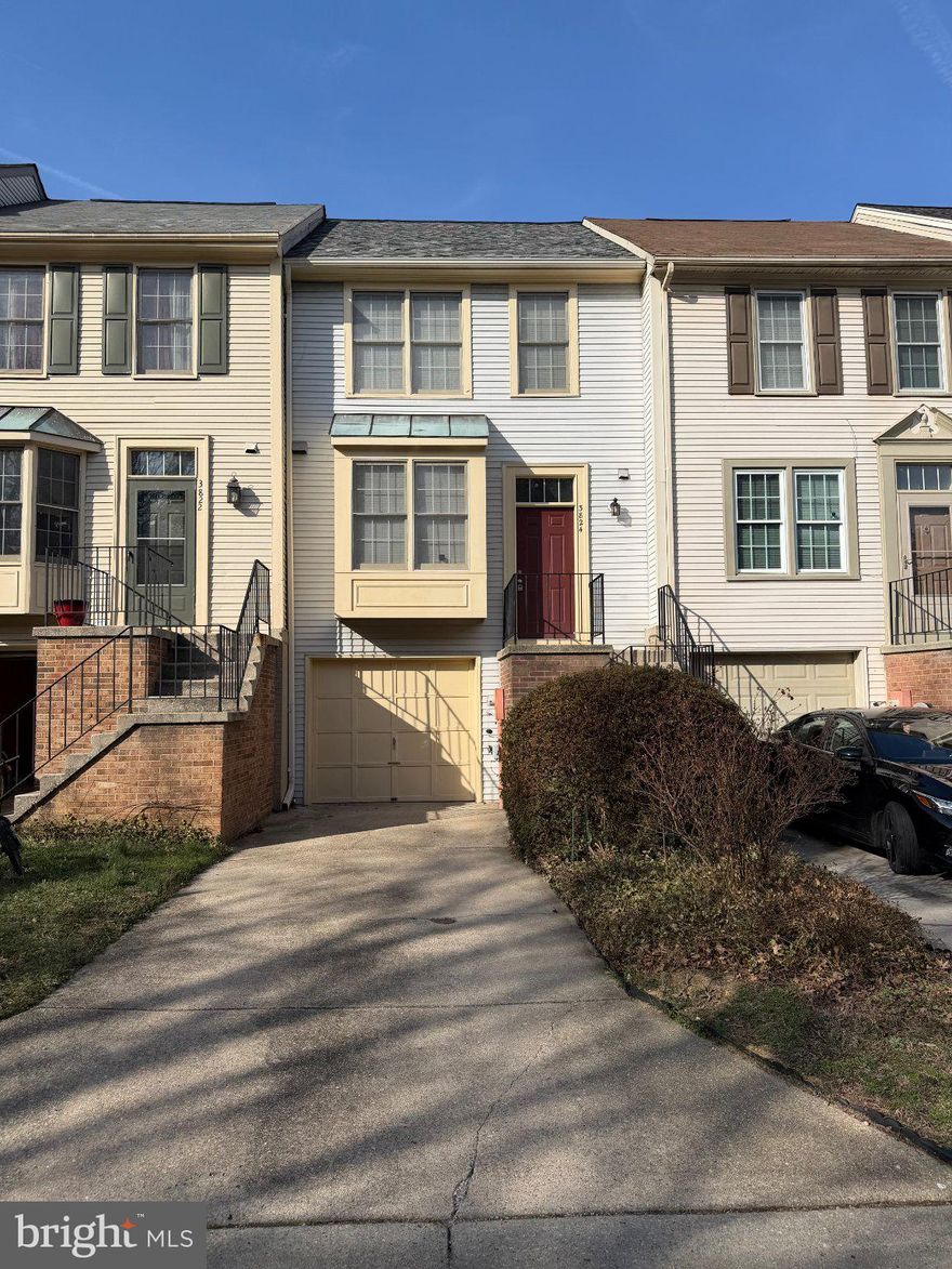 Welcome to this exceptionally well-maintained garage townhome in the desirable Silver Spring Country Club community. Lovingly cared for by its previous owners. 
This home features 2 spacious bedrooms, 2 full baths and a half bath . The main level boasts a bright and open layout with a sun-filled table-space kitchen, a dedicated dining area, and a large living room. Sliding glass doors lead to a generous deck overlooking a peaceful, treed setting—perfect for relaxing or entertaining.
Upstairs, the owner's suite features vaulted ceilings, abundant closet space, and a private bath with double vanity and shower. A second bedroom and full bath complete the upper level. The finished walkout lower level provides a versatile family room or additional living/sleeping space with direct access to the rear yard.
Ideally located just minutes from major commuter routes (MD-29, I-95, ICC), shopping, dining, and top employers. Directly across from Fairland Regional Park with trails, tennis courts, and recreational fields. A rare opportunity to own a beautifully maintained home in a quiet, convenient community—don’t miss it!
