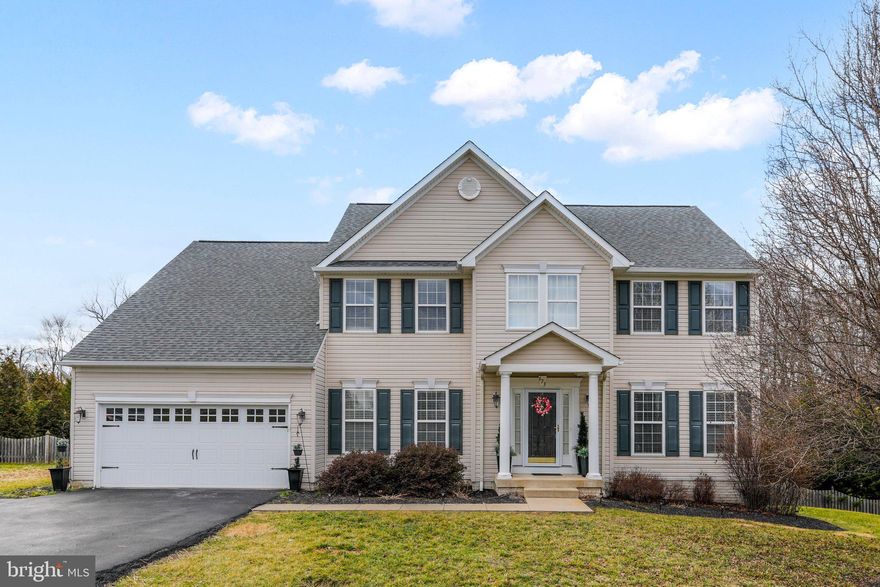 Welcome to 673 General Early Drive in the lovely neighborhood, Gap View Village!  This amazing 4400+ square foot home boasts 5 bedrooms and 3 1/2 baths.  You will be greeted by the beautiful, bright and sunny foyer that just pops! It is so pretty, you will be so excited to see the rest of the home! The main level has bamboo flooring and crown molding throughout. There is an office to the left of the foyer with ample work space and cabinets for storage. The huge gourmet kitchen includes stainless steel appliances, an island, and built in desk. There is also plenty of room for a large table in the eat in kitchen area.  As you step into the large family room your eyes will automatically be directed to the electric fireplace with stone wall. Spend your days on the large screened in porch off the kitchen.  There's also a grilling deck and a beautiful patio below with an awning. The bamboo steps lead you upstairs to find 4 bedrooms; the primary bedroom has bamboo flooring, high vaulted ceiling, and massive walk in closet! The primary bathroom has a double vanity, soaking tub, and shower stall. The 3 bedrooms have brand new bamboo flooring; installed January 2024.  The Jack and Jill bathroom has luxury vinyl plank flooring and tub shower.  Downstairs, there is a 5th carpeted bedroom, full bath with ceramic tile and tub shower.  There is a kitchenette that includes plenty of table space, counter space, sink, refrigerator, and microwave, perfect for a mother-in-law suite or teenager! There is a huge finished recreation room that leads out to the patio and hot tub - perfect for the cold, snowy nights!  Outside, the .75 acre lot is fenced entirely in the rear and has two play sets and a shed.  This beautifully decorated, well maintained home offers a LOT of living space, many upgrades, and just plain fun whether you are inside or out! The roof was installed 2018, both HVAC systems in 2017, and water heater in 2016.  Located ideally for anyone commuting to MD, DC, or VA. Close to schools, restaurants, shopping.  She's a beauty for sure!