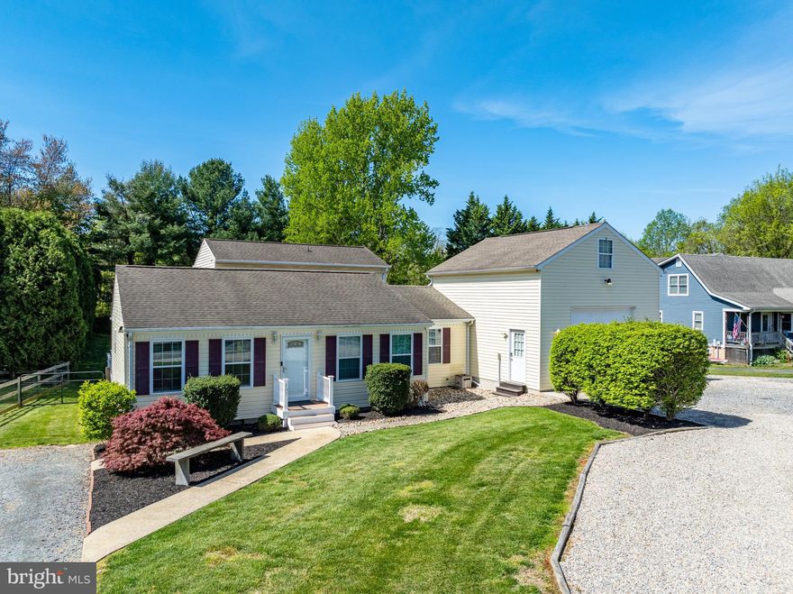 Situated on a double lot this Country Charmer is conveniently located between Centreville and Chestertown, yet a short distance from all the amenities of larger Middletown. DE area.  This home boasts so many great features. From the moment you walk in you'll fall in love with the gourmet kitchen, with its Quartz countertops, stainless-steel appliances, and luxury wood flooring throughout the main level. Looking for main level primary bedroom? We have that, with its own primary bath with dual vanities and a huge shower. There is also another bedroom with a full bath, plus the laundry closet is on the main level as well.  Wonder out into the living area you have a very large living room with access to the large screened in porch (24x12)to enjoy all those summer BBQ's and crab feast. If that isn't enough you have an equally as large deck (31x16)for all your grilling needs and it's Trex material so no need to worry about redoing that wood deck every year! The upper level has 2 more bedrooms and a full bath, great for a home office or even a playroom. One of the best features for the hobby enthusiast is the large garage with a Modine propane heater, a pit to change your oil or better access to get that classic car going and a built- in air compressor system, seller is even leaving the TV so you can enjoy the games while enjoying your outbuilding. It also has a walk up 2nd floor for storage or even a workout room. There is even a shed (32x12) behind the garage for even more storage. This home has so many great features it would last long! The dual HVACs are just under a year and a half old, and the windows were replaced in last 4 years.