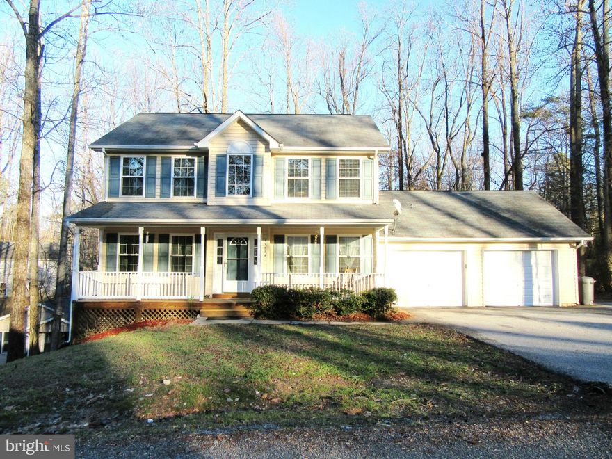 Big Bold Beauty! Spac Colonial on quiet st w/new paint/carpet throughout. Energy Star Home w/Low E windows. New HVAC sys w/3 sep zones. New Refr and upgraded quiet dishwasher. Fam Rm off Kit. Sep DR, Formal LR. Hdwd throughout main lvl. Mstr BR w/lux bath w/ jet tub, sep shwr, dble vanities, WIC. Lwr Lvl with 4th & 5th BR, Laundry Rm & Rec Rm. Fenced in backyard w/ dble deck. Wide paved driveway.