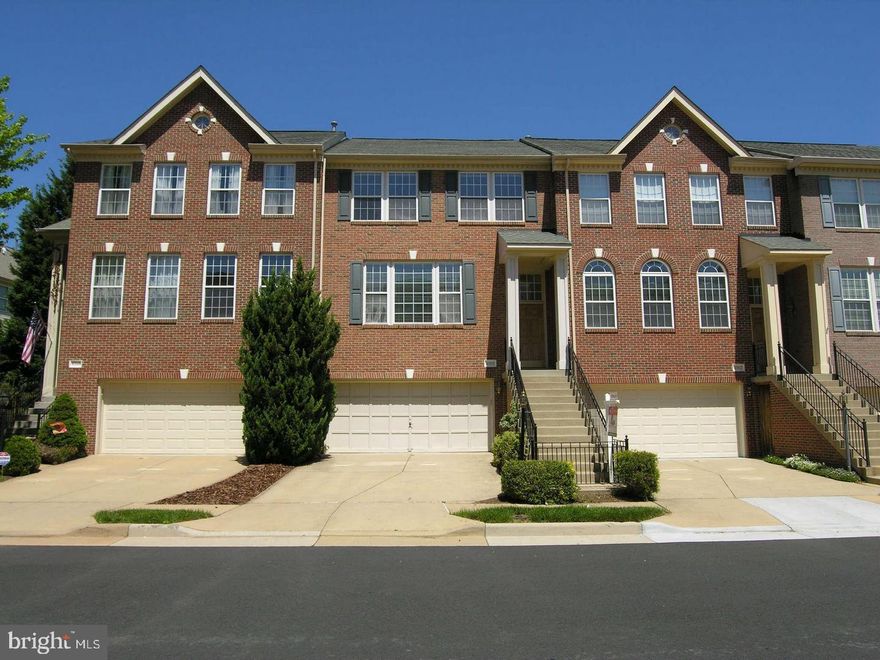 Beautiful 2-car garage townhome in the sought after Lowes Island.  New custom paint throughout the home with hardwood floors on the top two levels and lamented flooring in the basement.  Updated eat-kitchen with granite countertops off the family room.  Formal living and dining room with high ceilings.  Private deck off the kitchen with a scenic view.  Three spacious bedrooms upstairs with two full bathrooms and laundry.  Spacious basement with a full bathroom and walkout to the stone patio.  Huge two car garage with extra storage.  Lowes Island and Cascades amenities including multiple swimming pools, gym, bike trails and much more.  15 mins from Dulles Airport, 10-12 mins from Reston Town Center, a short drive to One Loudoun restaurants.   Must see today.