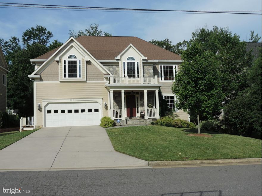 Sunlight  filled colonial in Haycock, Longfellow, McLean School Pyramid! Hardwoods on main level, granite kitchen counters and stainless appliances in gourmet kitchen.Large screened  porch with adjoining deck looking out over private yard. Fully finished walk out basement with full bath.. Master suite has large walk-in closet and beautiful master bath.. Too much to list! 1 Mile  to Metro!