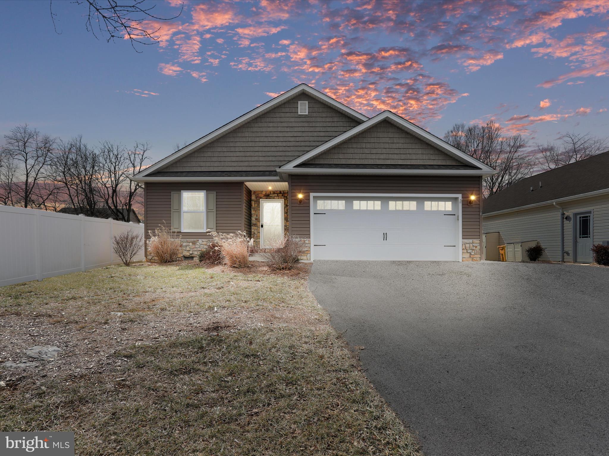 Popular Rancher Floor Plan with Three Bedrooms, Two Baths, Large Living Room & Kitchen with Open Layout! Located in Westfield Community in South Berkeley County with easy access to Commuting Routes of I81 and Route 51. Fenced in Rear Yard with Covered Rear Deck, and a Screened in Rear Porch. Two car garage with shared paved driveway. Lots of popular features including a kitchen pantry, walk in laundry, garage service door, and much more! Call For Details!
