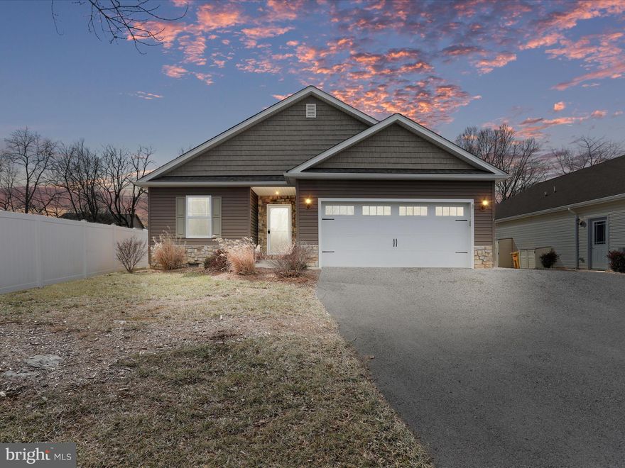 Popular Rancher Floor Plan with Three Bedrooms, Two Baths, Large Living Room & Kitchen with Open Layout! Located in Westfield Community in South Berkeley County with easy access to Commuting Routes of I81 and Route 51. Fenced in Rear Yard with Covered Rear Deck, and a Screened in Rear Porch. Two car garage with shared paved driveway. Lots of popular features including a kitchen pantry, walk in laundry, garage service door, and much more!  Call For Details!
