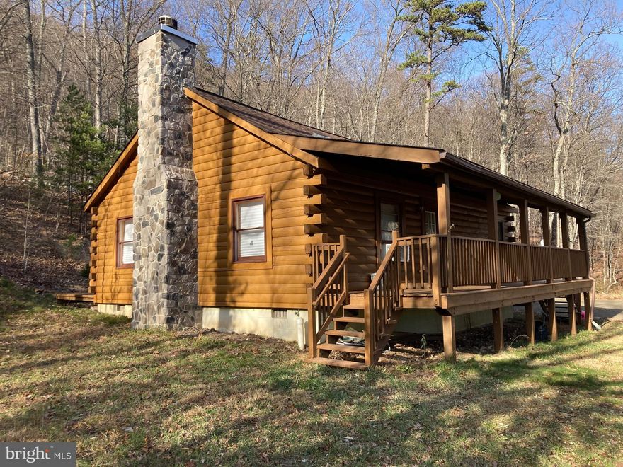 Look no further, if you have a 4 wheel drive vehicle you have found the perfect log cabin nestled in the woods of Fort Valley.  A place where you can enjoy your morning coffee sitting on the front porch overlooking the gorgeous Massanutten Mountain range. As you enter the property, you are welcomed to an open living room with stone fireplace, dining and kitchen combo. Also enjoy nature as you sit on the rear deck watching birds and all kinds of wildlife. The property borders the George Washington National Forest. No hunting on the property unless agreed upon by landlord. 4-wheel-drive required for seasonal weather.  https://apply.link/m_F-R0s  apply  today for this cozy mountain home.