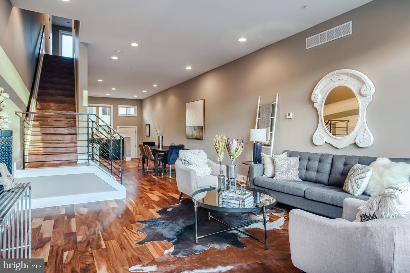 Gorgeous Bridgeview at the waterfront welcomes you to this, 3 bedroom, 3 bathroom oasis featuring a chef's kitchen, quartz countertops, GE appliances, spa-style washrooms, a full floor master suite, walk in closet, finished basement and roofdeck! Several years remain on the tax abatement and this gem is located in the Meredith School catchment. This waterfront property boasts reserved parking for each unit, stunning landscape design and a dog park and green space for its residence. Step through the front door to discover a phenomenal open concept great room and dining area with a connected chef's kitchen. Your astounding gourmet kitchen comes complete with state of the art GE appliances, gleaming natural quartz countertops, and hand crafted wood cabinetry. Continue along the elegant hardwood floors to the 2nd floor where you'll reveal two spacious bedrooms fit with colossal double-hanging closets and matching spa-style washrooms. Then find your way to the next floor and bask in the crowning jewel of this unbelievable luxury townhome; a sprawling 700 square foot master bedroom fit for the elite! This tastefully handcrafted master suite features massive his and hers walk-in closets with custom designed shelving and an enchanting master bathroom that leaves nothing to be desired. Spoil yourself with double vanities and open glass shower, crafted with gorgeous European porcelain tile, stylish riverstone flooring, and dual shower heads. And if that's not enough, we have also included a spacious finished basement for added storage and a sweeping rooftop sundeck with connected drybar and wine fridge! All square footage numbers are approximate and include above and below grade square footage. Square footage should be verified by the buyer. It is the responsibility of the buyer to verify real estate taxes.