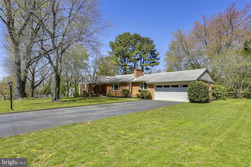 Spacious and Light Filled All Brick Rambler with Beautiful .69 Acre Lot in Warrenton Lakes. Gorgeous Hardwood Floors Throughout Most of Main Level 3 Bedrooms 3 Updated Baths Large Living Room with Gas Fireplace Cozy Den with Pine Walls Master Suite w/Updated Master Bathroom Freshly Painted  Basement with Storage Patio&Porch 2+Car Garage Huge Private Backyard Next to Common Area