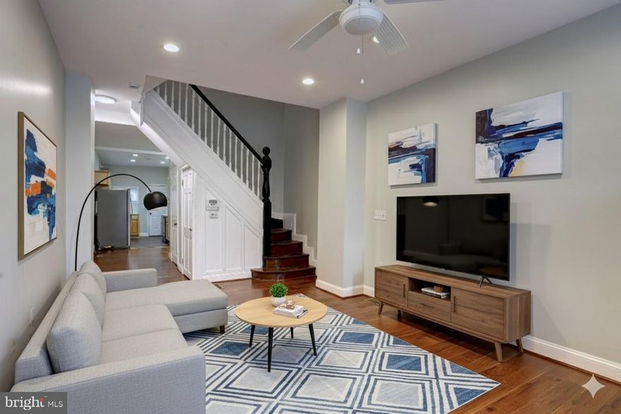 Welcome to **2321 Barclay Street** — where timeless charm meets modern luxury in this beautifully renovated 3-level traditional rowhouse. Tucked away in the heart of Baltimore, this 3-bedroom, 2.5-bathroom gem offers more than just a place to live — it’s a place to thrive. Step inside and be greeted by an inviting open-concept main level, blending historic character with contemporary finishes. The kitchen, features sleek countertops and stainless steel appliances — perfect for both quiet mornings and lively entertaining. Upstairs, you'll find 2 spacious bedrooms and a spa-inspired bathroom. The top level adds flexibility with an additional room, full bathroom and a *bonus third-level retreat* ideal for a home office, creative studio, or cozy reading nook. Whether you need extra space to work, play, or relax, this home delivers. Outside, enjoy a generously sized backyard — a rare find in city living — offering room to garden, entertain, or simply unwind. Everything has been thoughtfully updated, so you can move right in and start living. Whether you're a first-time buyer or upgrading your lifestyle, **2321 Barclay St** is ready to welcome you home.