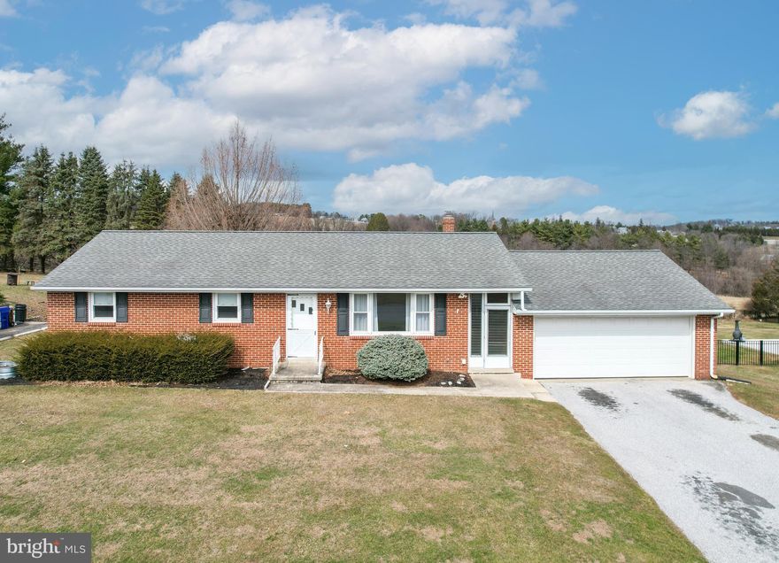 A cherished family home since it was first built, this classic brick rancher is ready to welcome its next chapter. Featuring a large attached two-car garage, the home offers comfort, character, and several thoughtful updates throughout.

The beautifully remodeled main bathroom is sure to impress, while the hardwood floors in the living room, dining room, and all three bedrooms add warmth and timeless appeal. Fresh neutral paint mostly throughout the upper level (2026), along with several newer windows, creates a bright and inviting atmosphere that most buyers will appreciate.  The kitchen offers a charming retro feel, giving you the perfect opportunity to update and design it in your own personal style — and the refrigerator has been recently replaced.

The enclosed breezeway provides a convenient and comfortable transition into the home—perfect after a busy day. Major improvements include the removal of the original boiler and baseboard heating, replaced with a modern HVAC system in 2022, along with a newer hot water heater for added efficiency and peace of mind.

Outside, the spacious and level backyard offers plenty of room to enjoy, complete with a deck and an additional storage shed for convenience.

The lower level is currently in the process of remodeling and presents a wonderful opportunity for buyers to add their own finishing touches. It already features a nicely completed half bath, and in 2022 the space was enhanced with a Mitsubishi mini-split system that provides both heating and air conditioning for added comfort.

This property is a must-see home with a convenient location.