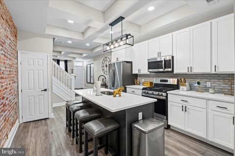 Photo of 1528 N Ellamont Street, BALTIMORE, MD 21216 (MLS # MDBA2203340)