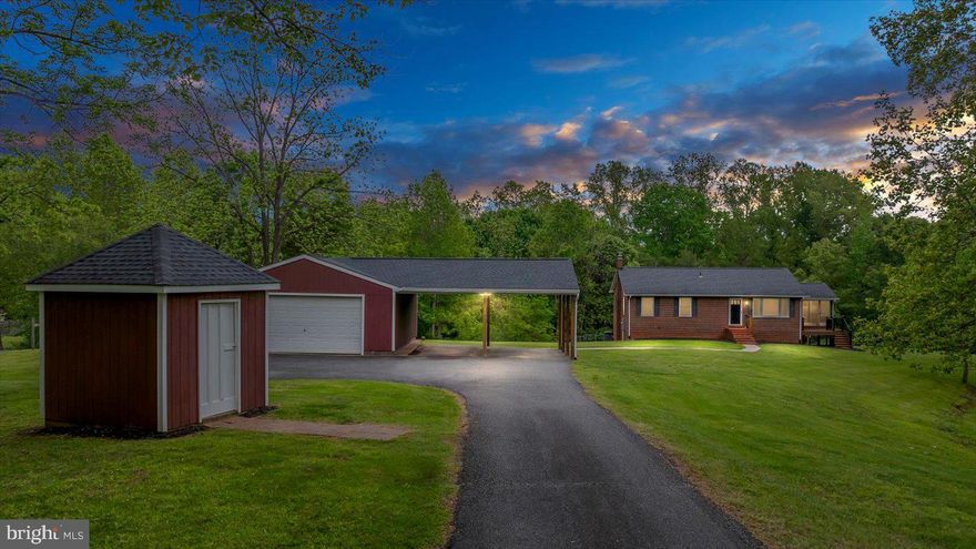 Welcome to 47 Old Farm Road – where modern comfort meets peaceful privacy. This fully remodeled 3-bedroom, 3-bath home offers over 2,200 square feet of beautifully updated space, set on a private, picturesque 4.39 acre lot with outstanding curb appeal. The main level has been thoughtfully renovated with brand-new flooring, fresh paint, new cabinetry, an elegant backsplash, and modern appliances, creating a warm and inviting interior that’s move-in ready.

A screened porch with low-maintenance Trex decking extends the living space outdoors, ideal for year-round enjoyment. The home features a spacious walk-out basement and a detached two-car garage with an additional two-car covered parking area. Recent updates include new windows installed in 2023, as well as a roof and HVAC system both replaced within the last 10 years—ensuring long-term peace of mind.

Despite its private, tranquil setting, this home is just minutes from I-95 and nearby shopping, making daily convenience a part of its appeal. Whether you're entertaining, relaxing, or simply enjoying the quiet surroundings, 47 Old Farm Road delivers comfort, style, and location in one outstanding package.