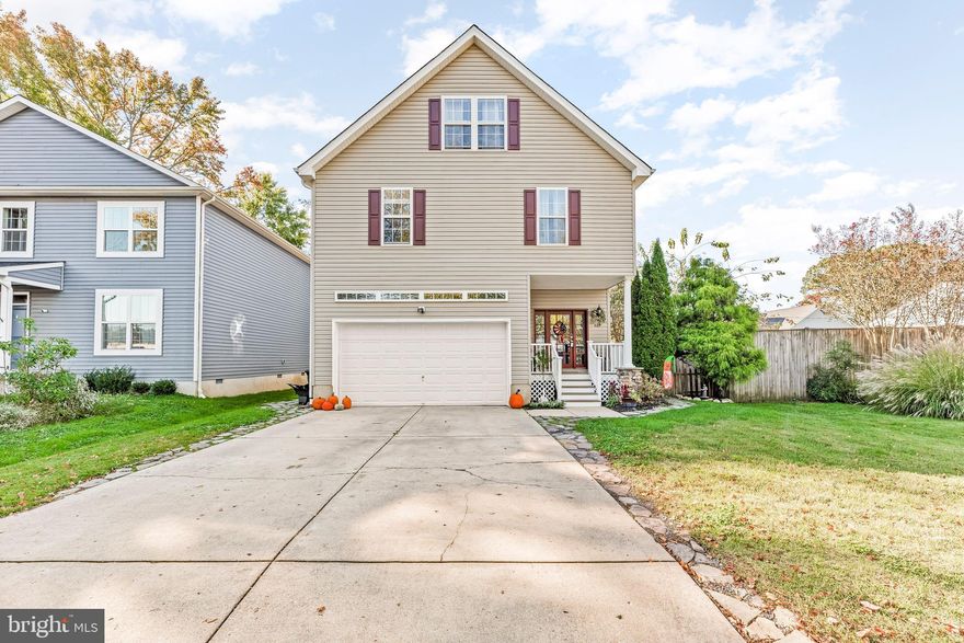 NEW YEAR NEW PRICE!!!!!! Welcome home! 

From top to bottom, this home is simply immaculate . Pull into your two-car garage and fall in love each times you step into your dream home. Enjoy this open floor plan with gorgeous new hardwood floors and lots of natural light pouring into the french doors. with water views and a  beautiful fenced-in backyard with a stone patio and large deck, you will forever want to entertain.

The kitchen is adorned with black stainless steel appliances that are less then 4 years old. Keep warm this winter with  your gas fireplace and heating system that is only 5 years old. Venture up the stairs to the four bedrooms with fresh carpet and newly painted walls , laundry and large primary bedroom with beautiful wainscotting on the walls and a large en-suite bathroom.

 Continuing up the stairs will you will find a bonus room/extra bedroom/family room or whatever your heart desires. This room comes with its own rooftop deck overlooking RockHold Creek.

 Located within walking distance of shopping and restaurant.s. All together, this home has everything you've been looking for, plus some.