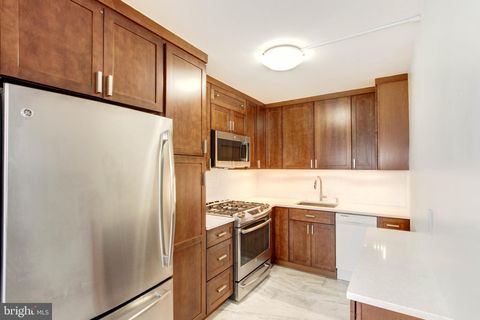 Photo of 4515 Willard Ave #2201S, Chevy Chase, MD 20815 (MLS # MDMC2077440)