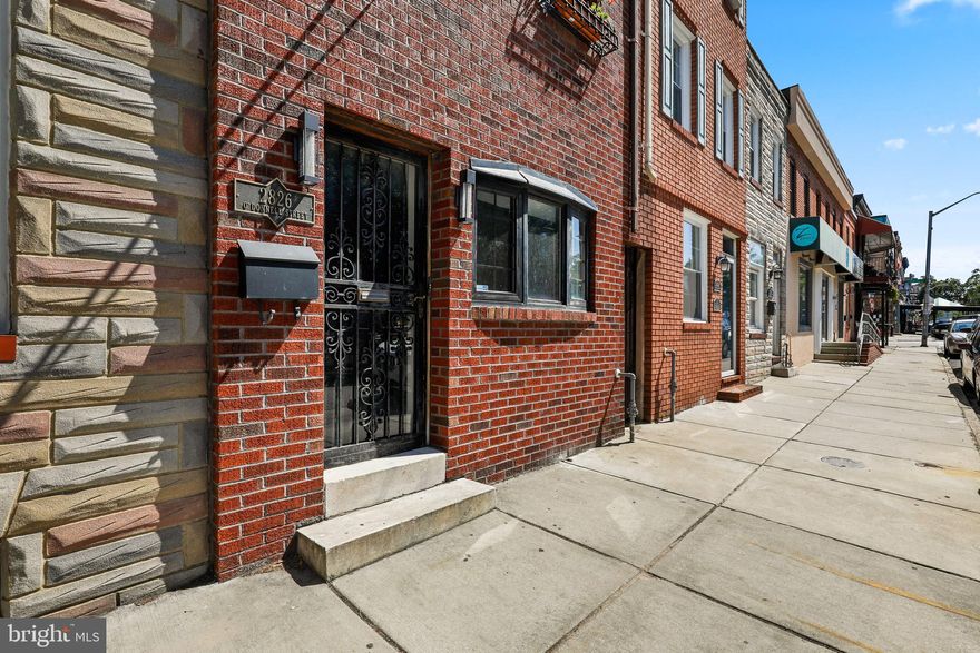 Beautiful 3 story all brick row home steps from Canton Square.  This residential property is also zoned for commercial use & could make a great store front or office location.  Currently set up as a 3 bedroom row home with an open floor plan on the first floor with hardwood floors, brick fireplace, galley kitchen, separate dining room, and access to the rear parking pad!   The second floor features a large front bedroom, full sized laundry room, an office nook next to the access to rooftop deck, and another bedroom in the rear of the second floor.   The entire 3rd floor is set up as the owners suite with big bedroom that flows into the full bathroom.  This home is totally livable as-is & has tons of potential - waiting for your finishing touches!